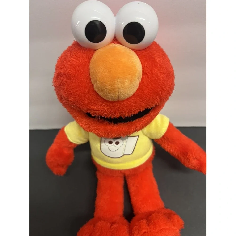 Sesame Street‎ Potty Elmo Toy Plush Talks Sings - works great